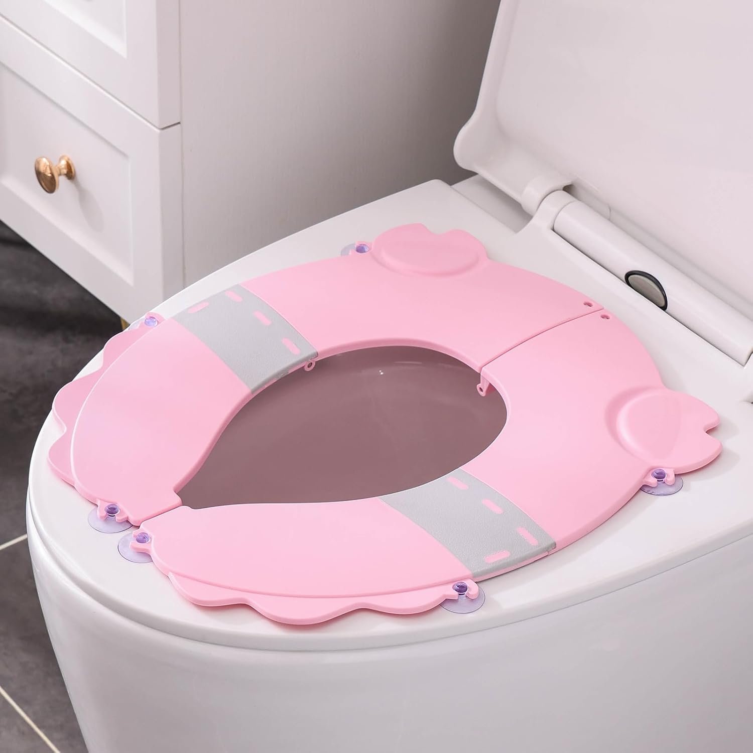 Portable Potty Training Seat，Upgraded Non-Slip-Anti pinch buttocks, One-handed Removal Folding Travel Potty Seat for Toddlers & Kids, 6 suction cups firmly adhere, Fits All Shape Toilets(Pink)